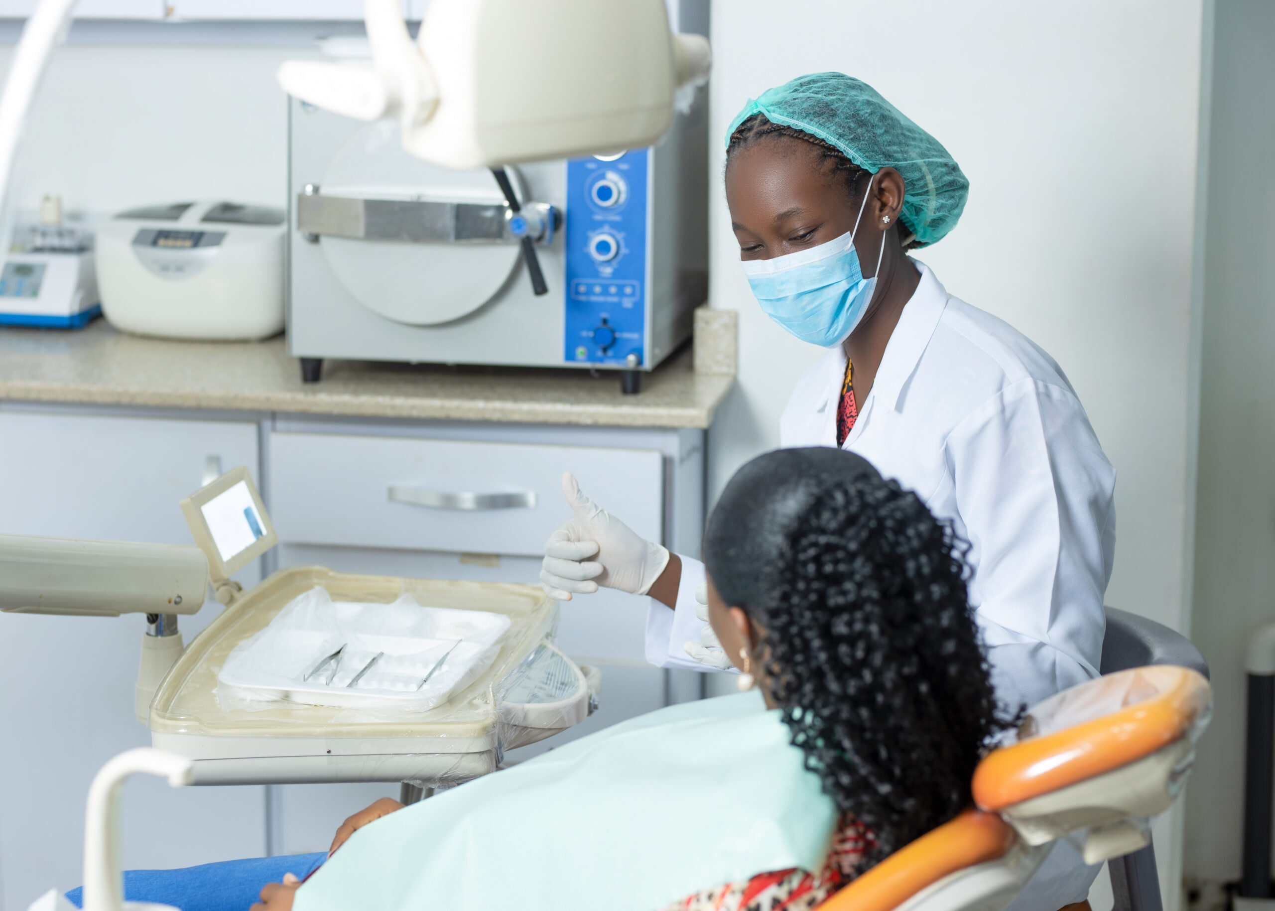 A dentist consulting with a patient at Serepa dental clinic